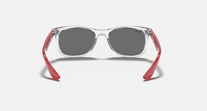 Ray-Ban Junior New Wayfarer RJ9052S sunglasses with clear frame and red temple accents