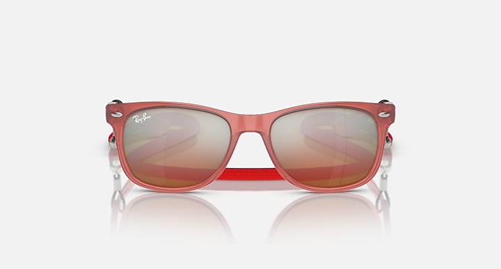 Ray-Ban Junior New Wayfarer RJ9052S sunglasses with pink frame and amber gradient lenses