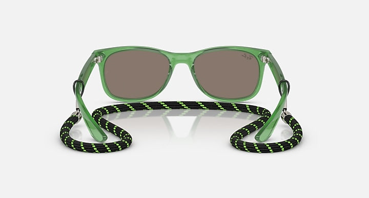 Ray-Ban junior wayfarer sunglasses with green frames and brown-tinted lenses, angled view