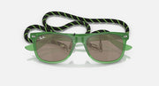 Ray-Ban junior wayfarer sunglasses with green frames, darker lenses, patterned neck strap