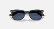 Ray-Ban Junior Wayfarer sunglasses, front view; dark frame with deep blue lenses.