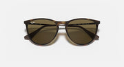 Junior sunglasses with dark frame and olive gradient lenses