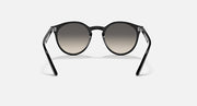 Ray-Ban RJ9064S sunglasses with black frame and dark tinted lenses