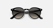 Ray-Ban RJ9064S sunglasses with black round frame and dark gradient lenses