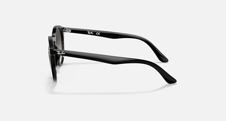 Ray-Ban RJ9064S sunglasses, black frame with dark lenses, side profile