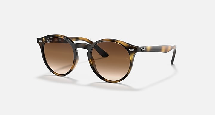 Ray-Ban RJ9064S sunglasses with tortoise brown frame and amber gradient lenses