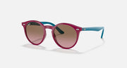 Purple round sunglasses with rose gradient lenses and teal accent temples.