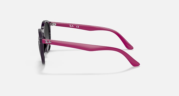 Magenta round sunglasses with dark lenses, angled side view.