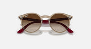 Ray-Ban round sunglasses, angled front view, bronze frame with brown and maroon accents