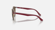 Ray-Ban round sunglasses side view with maroon frame and gradient brown lenses