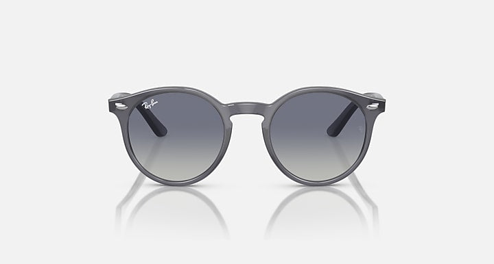 Ray-Ban RJ9064S round sunglasses, straight-on, with dark lenses and grey frame