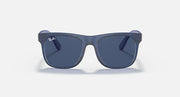 Sunglasses with navy blue frames and dark lenses, featuring curved rubber temple tips