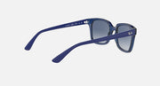 Sunglasses with blue frame and dark blue gradient lenses, angled side view
