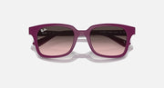 Sunglasses with cherry/pink frame and dark gradient lenses, front view