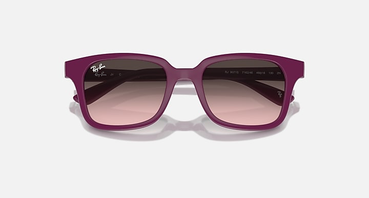 Sunglasses with cherry/pink frame and dark gradient lenses, front view