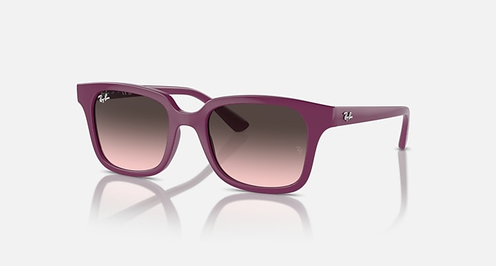 Sunglasses with cherry/pink frame and gradient lenses, square cat-eye shape