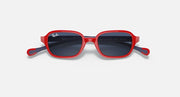 Red kids sunglasses with dark blue lenses and Ray-Ban logo on the temples