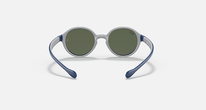 Ray-Ban round sunglasses with light gray frame and dark green lenses.