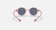 Ray-Ban round sunglasses with pale pink frame and dark gray lenses.