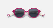 Ray-Ban round sunglasses with dark lenses, magenta frame, and side accents
