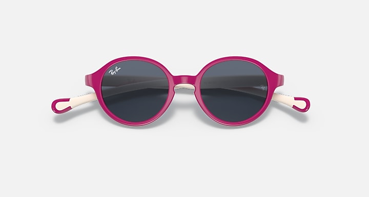 Ray-Ban round sunglasses with dark lenses, magenta frame, and side accents