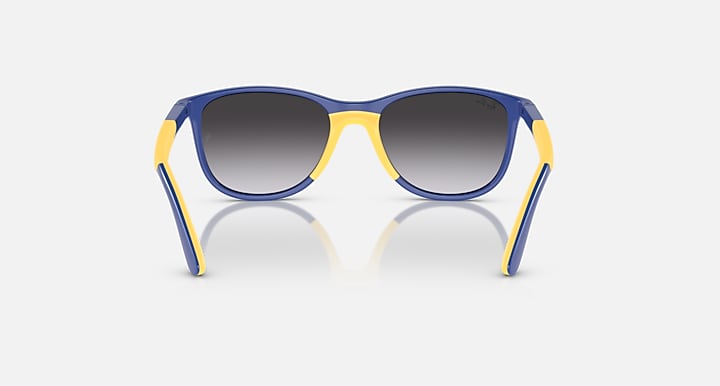 Ray-Ban sunglasses with blue frame, yellow side arms, dark gray gradient lenses