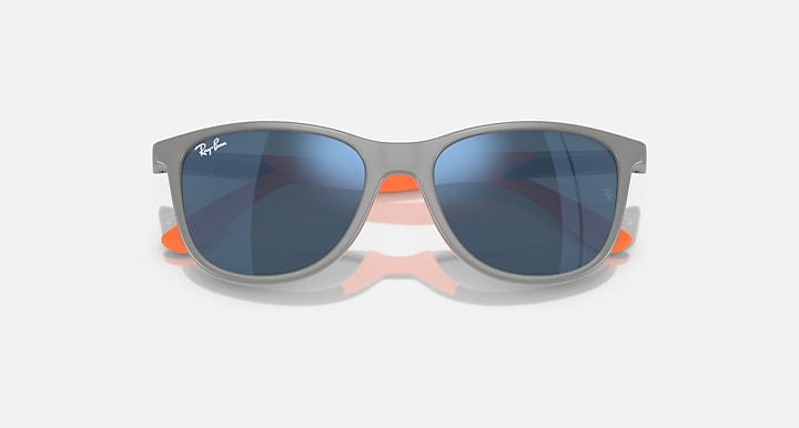 Front view grey and orange rubber sunglasses with dark blue mirrored lenses
