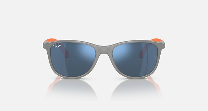 Grey sunglasses with dark blue mirrored lenses and orange side accents