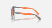 Side view of grey and orange rubber sunglasses with dark blue lens