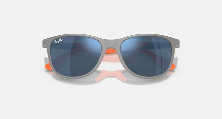 Ray-Ban sunglasses with grey frames and dark lenses with subtle orange accents