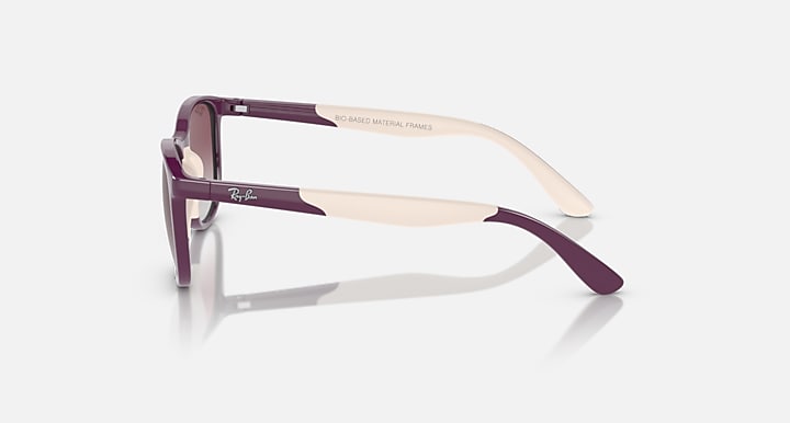 Ray-Ban sunglasses side view with purple frame and light beige temple tips