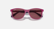 Pink Ray-Ban sunglasses with dark maroon-tinted lenses and glossy front frame