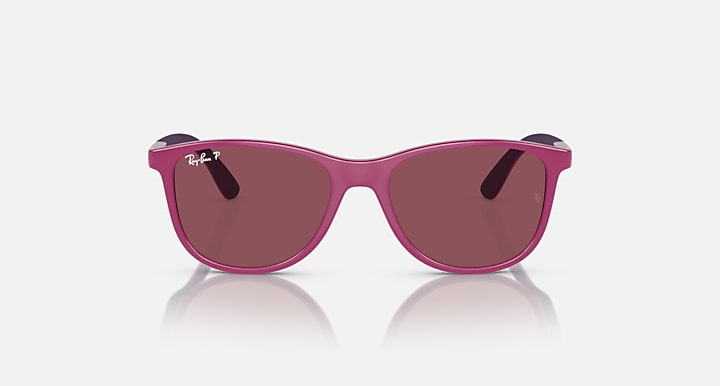 Pink Ray-Ban sunglasses with tinted purple lenses, front view with thick rounded frame