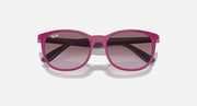 Purple sunglasses with dark gradient lenses and glossy frame finish