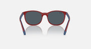Red sunglasses with dark gray lenses and blue accents on the temples