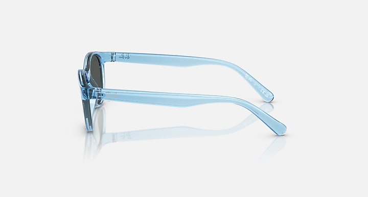 Transparent blue sunglasses side view with dark grey lenses