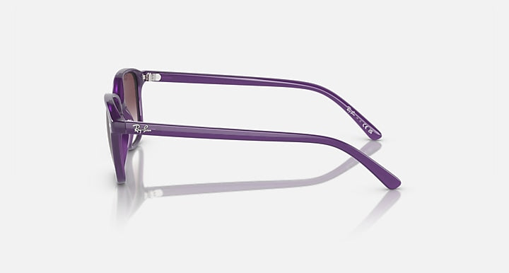 Ray-Ban RJ9093S sunglasses, violet translucent frame side view, dark lenses