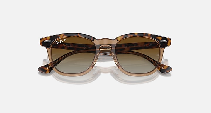 Ray-Ban tortoise cat-eye style sunglasses with brown gradient lenses, angled view