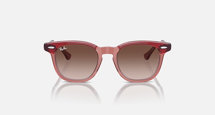 Ray-Ban transparent red sunglasses with rose-tinted lenses, front view