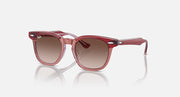 Ray-Ban transparent red sunglasses with brown gradient lenses and clear arms