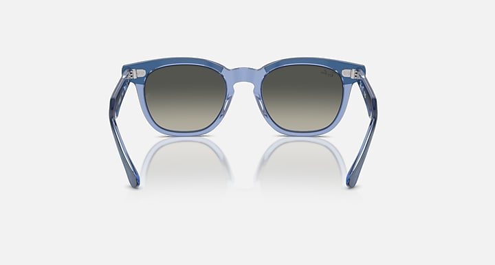 Ray-Ban RJ9098SF sunglasses front view in light blue with dark, tinted lenses