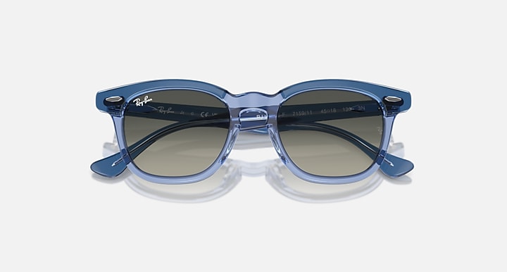 Ray-Ban RJ9098SF sunglasses, light blue frames with olive-tinted lenses and side logo