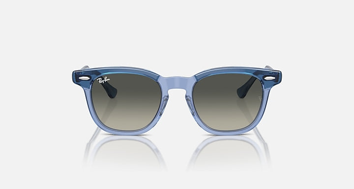 Ray-Ban RJ9098SF sunglasses, light blue cat-eye style, dark lenses with reflective finish