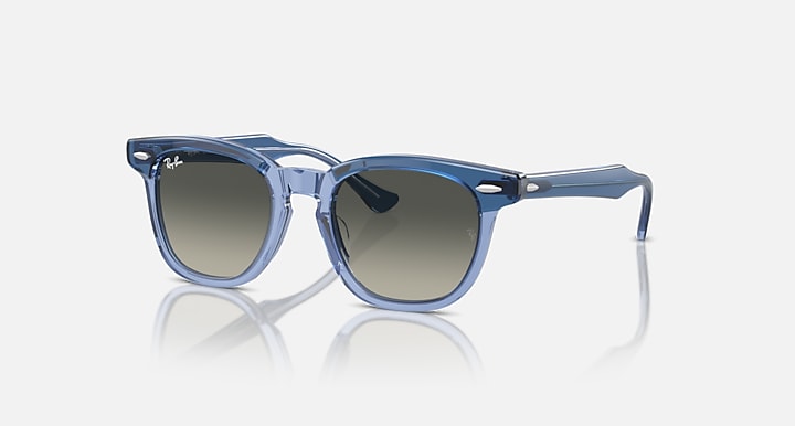 Ray-Ban RJ9098SF sunglasses with light blue frames and dark green gradient lenses