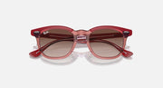 Ray-Ban sunglasses with red-pink frame and dark brown lenses, front view