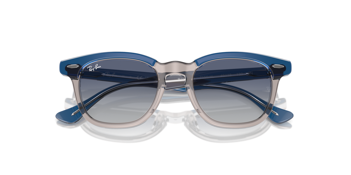 Ray-Ban kids sunglasses with blue frame and dark blue gradient lenses, close front view.