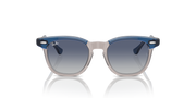 Ray-Ban kids sunglasses with blue translucent frame and round dark lenses, front view.