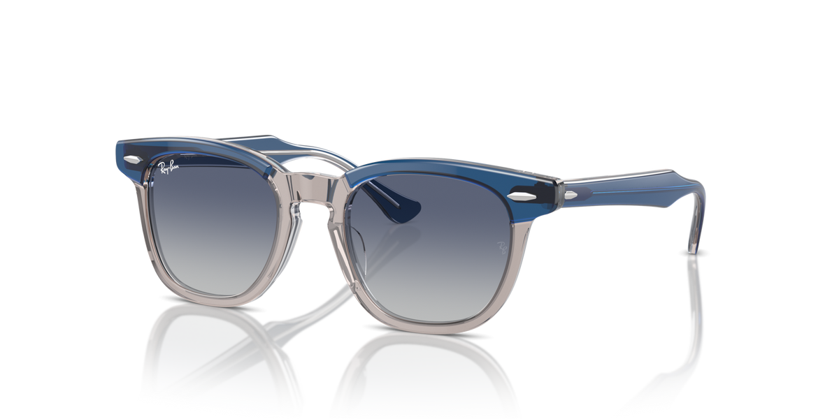 Ray-Ban kids sunglasses with blue frame and dark blue gradient lenses, front view.
