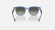 Ray-Ban RJ9098S sunglasses with light blue transparent frame and gradient brown lenses, front view