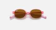 Pink transparent oval sunglasses with brown tinted lenses and short bridge